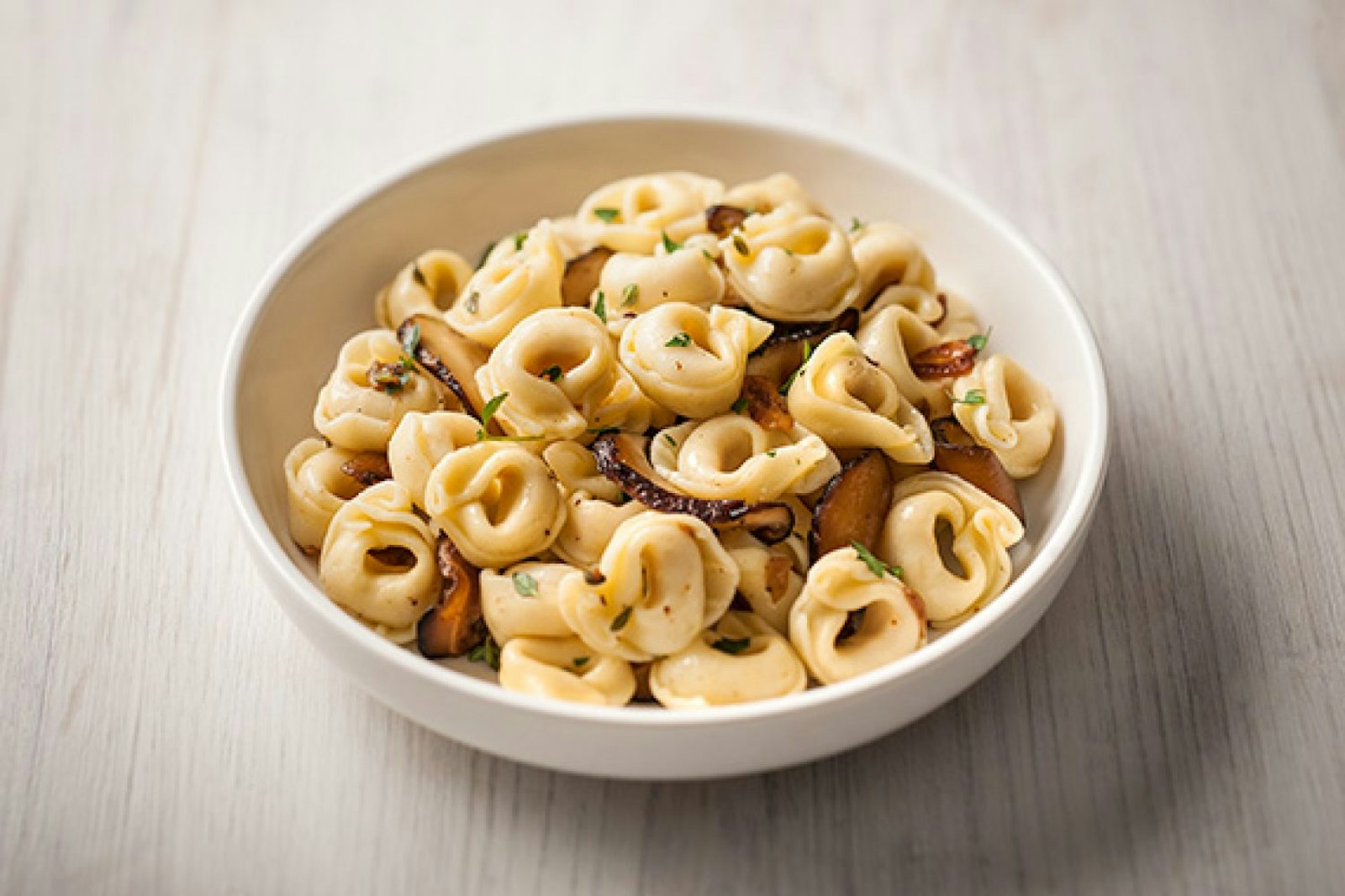 Cheese Dried Tortellini with Kale, fresh ricotta and walnuts San Remo
